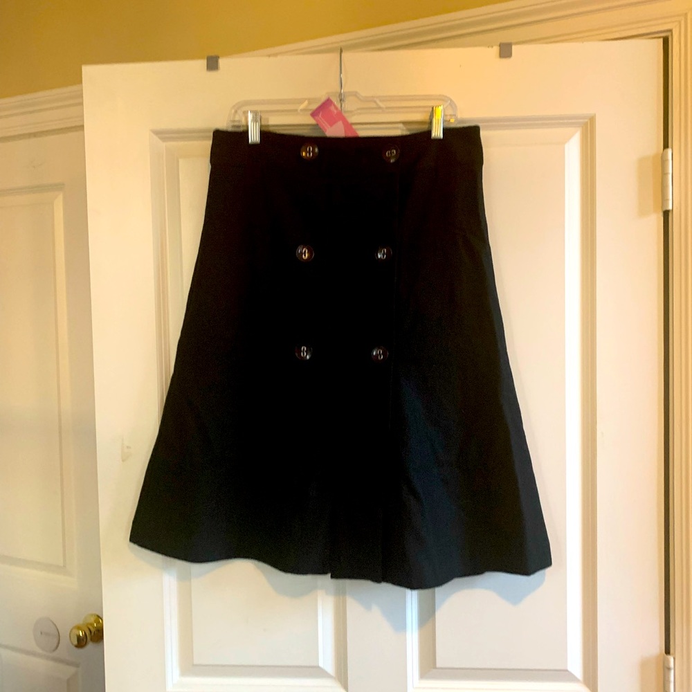 New, NY designer midi skirt with buttons. Flare, flattering 50% wool, lined.